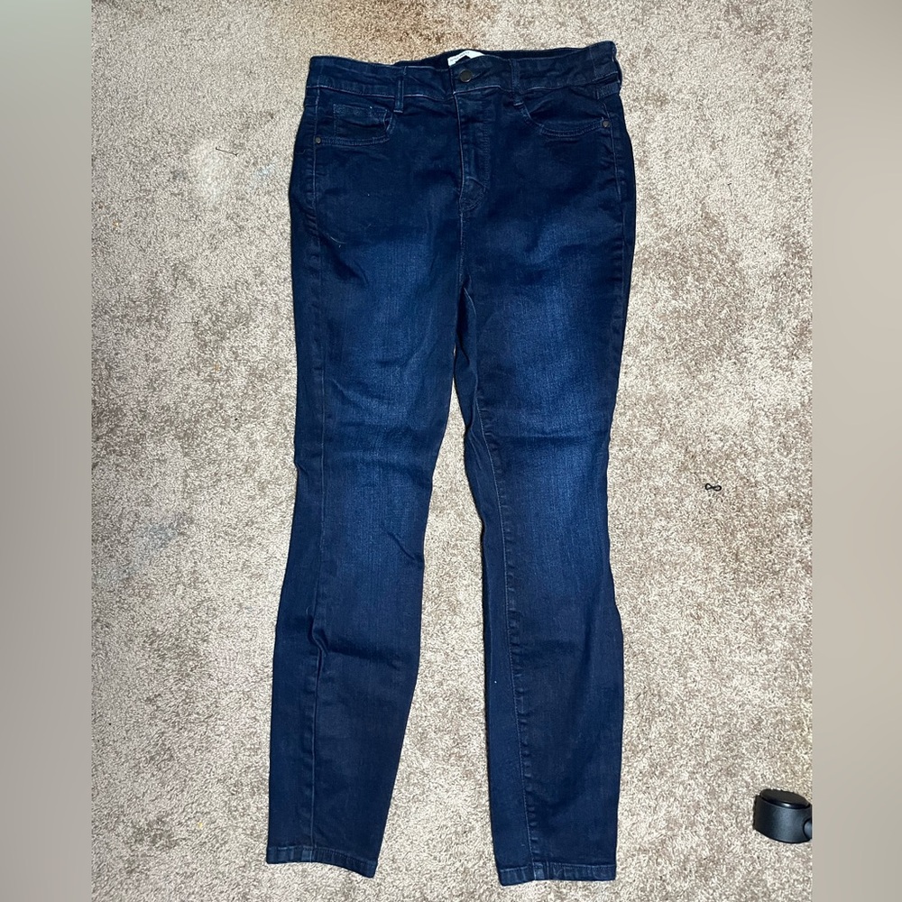 Dark blue skinny jeans, size 12 from Nine West. They’ve never been worn.